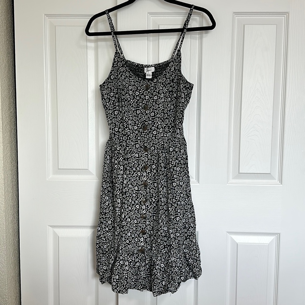 Black and white floral sleeveless dress.